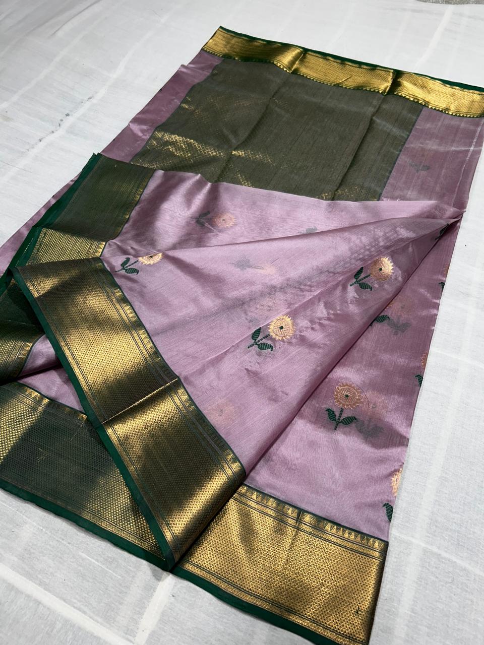 Pastel pink pattu silk saree with meena work nakshi border