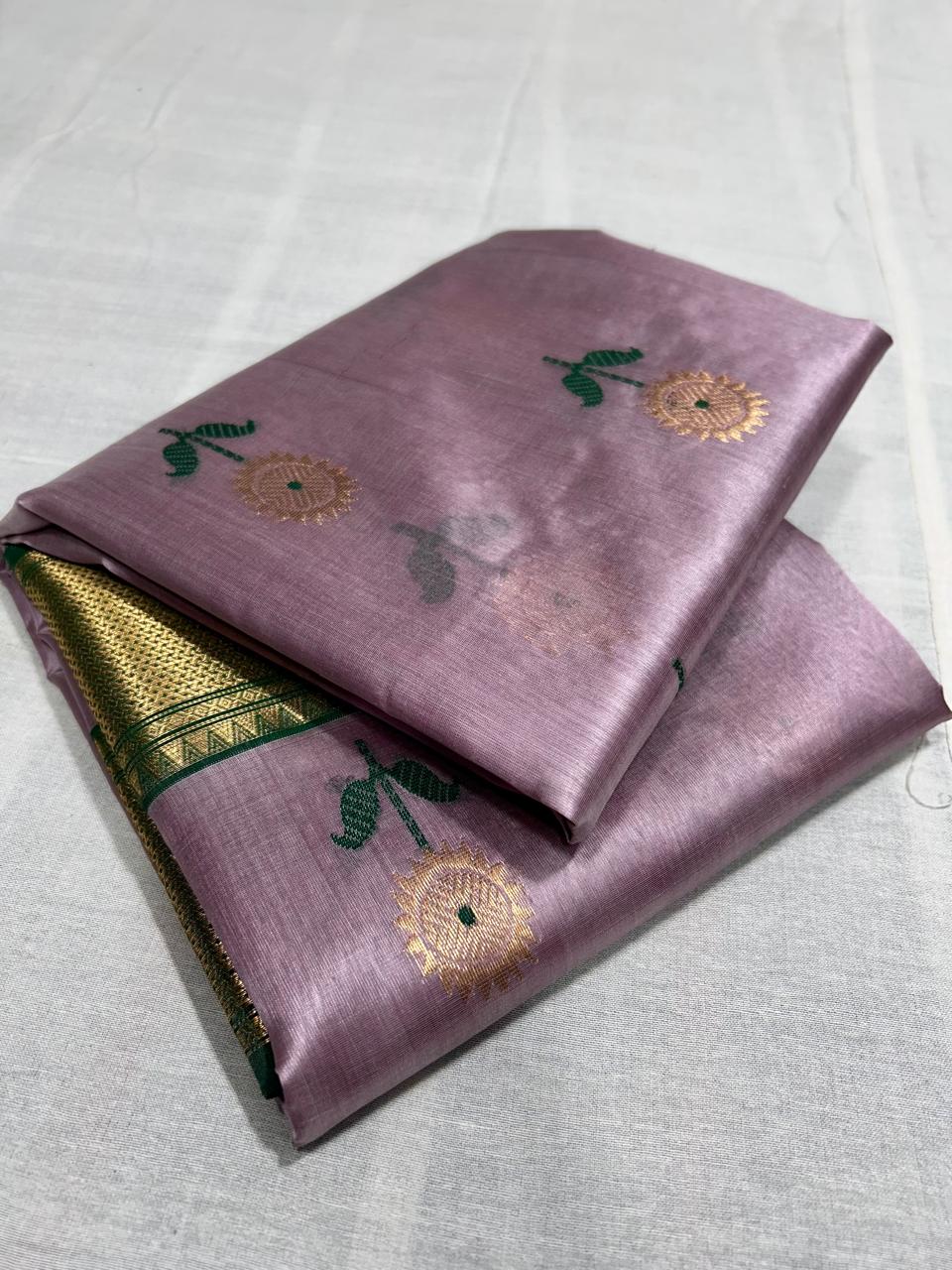 Pastel pink pattu silk saree with meena work nakshi border
