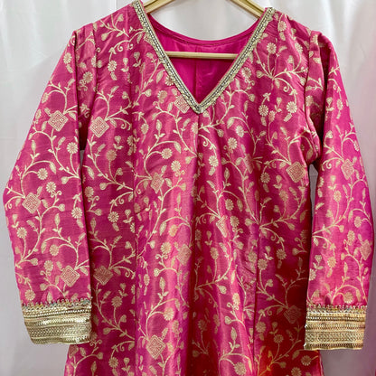 Pink anarkali salwar kameez suit designed with embroidered tissue fabric