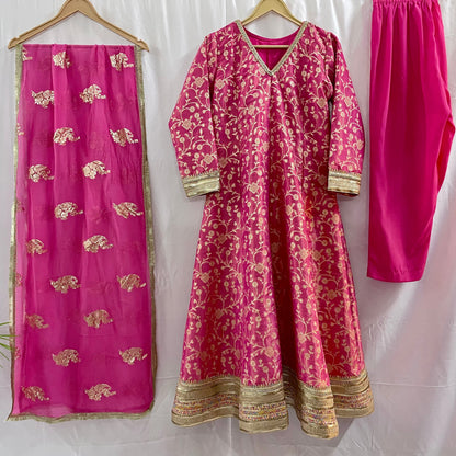 Pink anarkali salwar kameez suit designed with embroidered tissue fabric
