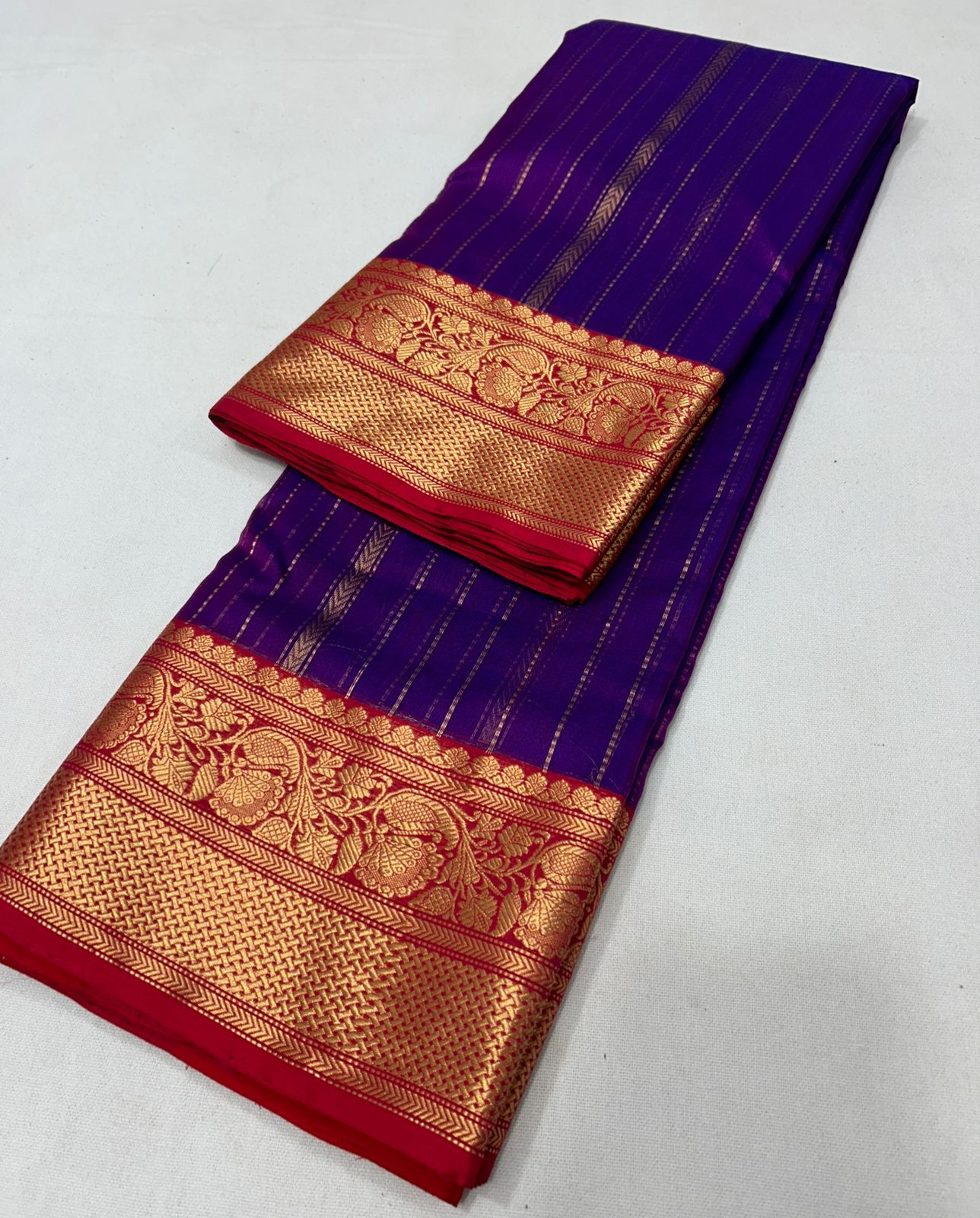 Purple katan silk saree with wide border