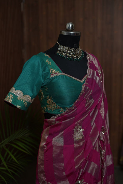 Full front view of magenta dual-texture saree with metallic stripes and embellished border
