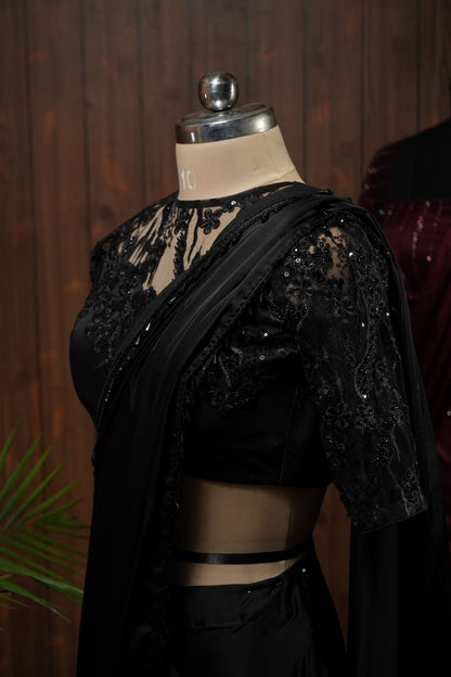 Black draped saree with sequin embroidered net blouse, full front view