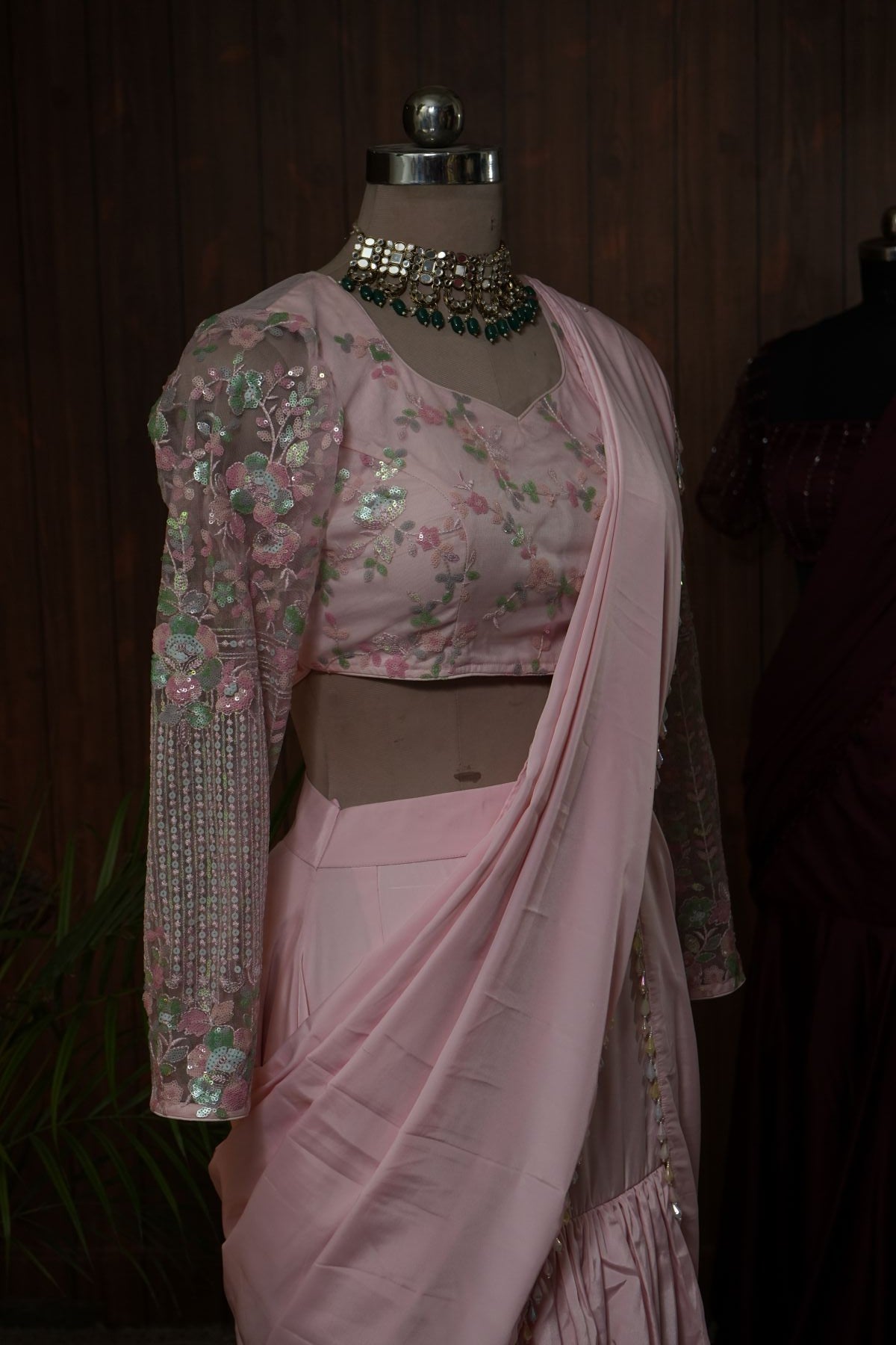 Blush pink saree drape and coordinating floral embellished blouse