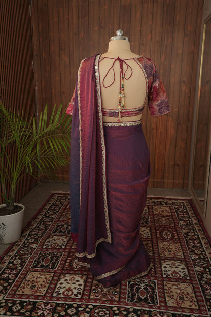 Side detail of plum saree border and patterned blouse