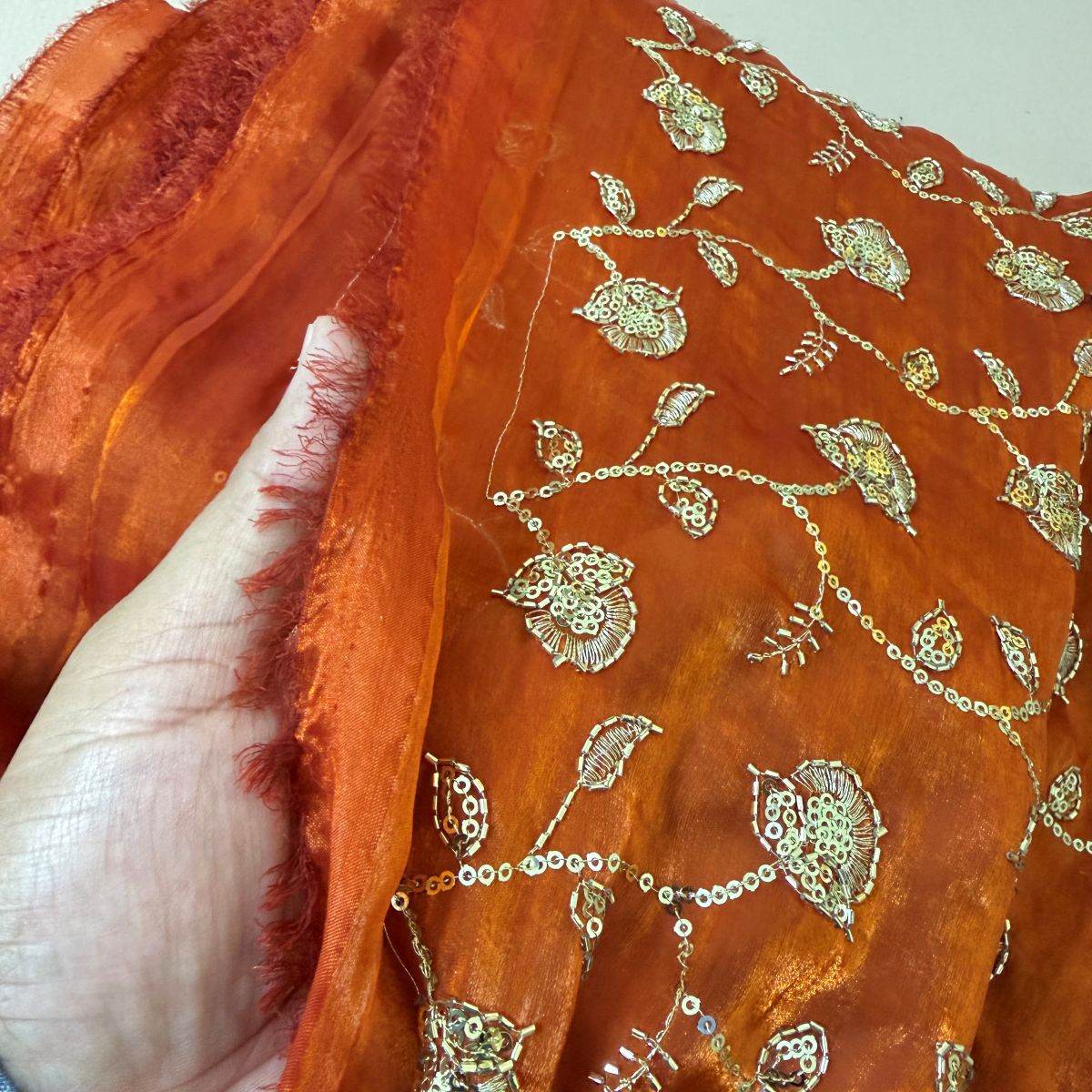 Gota patti border and gold latkans with embroidered fabric