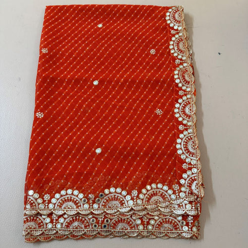 Green embroidered leheriya dupatta with ornate decorative border