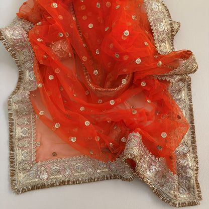 Orange dupatta with scattered gold motifs and decorative border