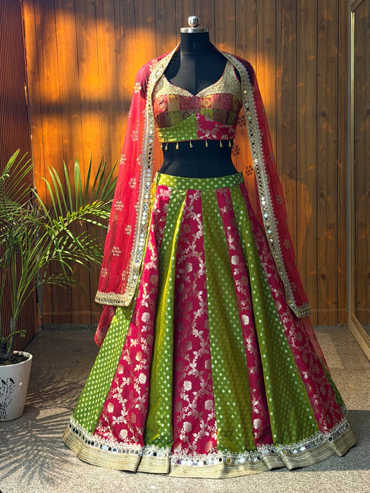 Close-up of floral pink and dotted green skirt panels with reflective gold-toned border