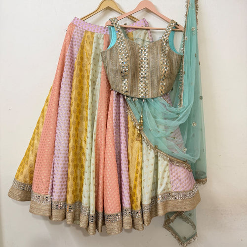 Pastel multicolour panelled lehenga with mirror-work blouse and sheer aqua dupatta
