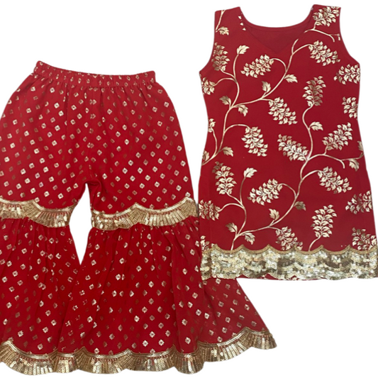 A kids' sharara dress and tank top set in red with gold embellishments and a floral pattern.